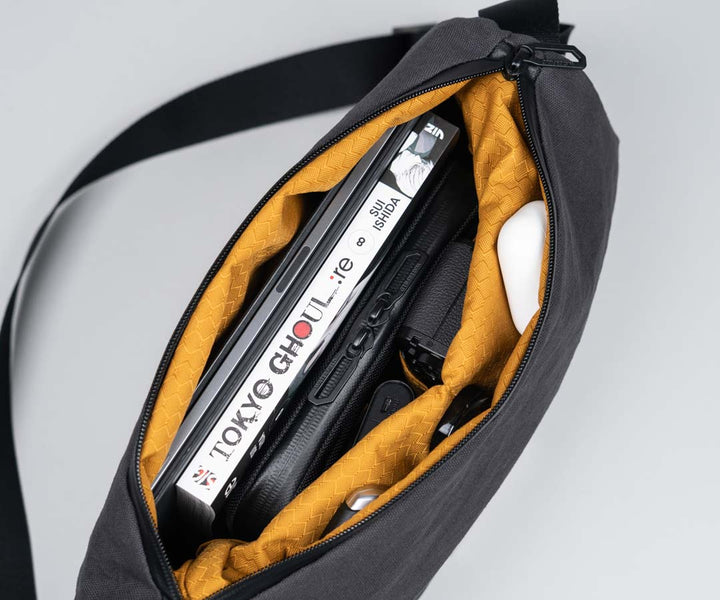 one zipper provides instant access to the main compartment and flap pocket.