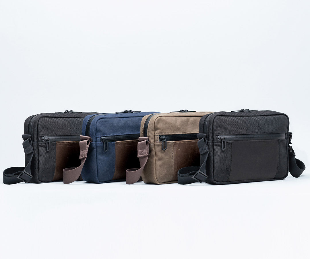 Available in traditional waxed canvas or ballistic nylon