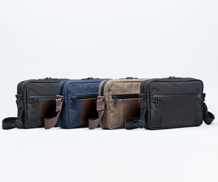 Available in traditional waxed canvas or ballistic nylon