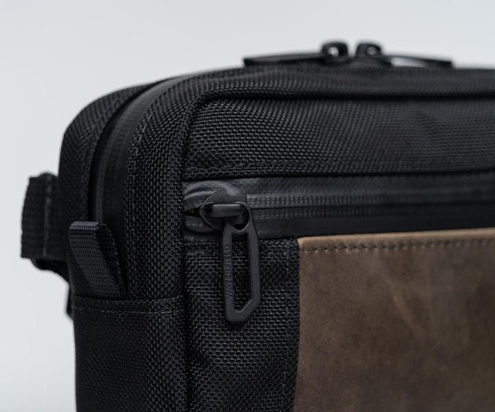 Premium water-resistant YKK zippers throughout