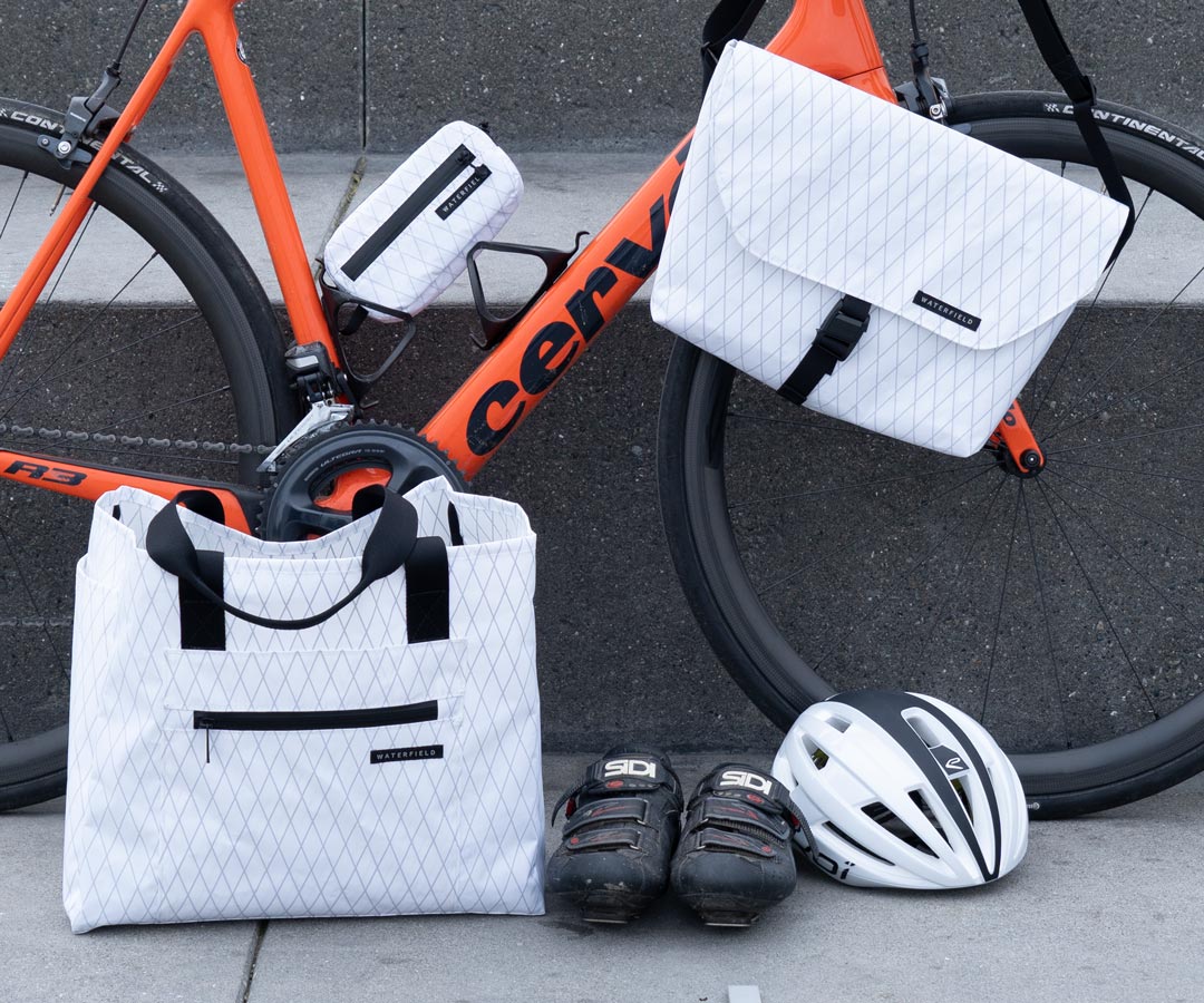Cycling Accessories — Limited EditionVitesse Musette, Jersey Pocket Tool Kit, Cycling ToteX-Pac's® durability, water-resistance, and light weight help weather the elements.
