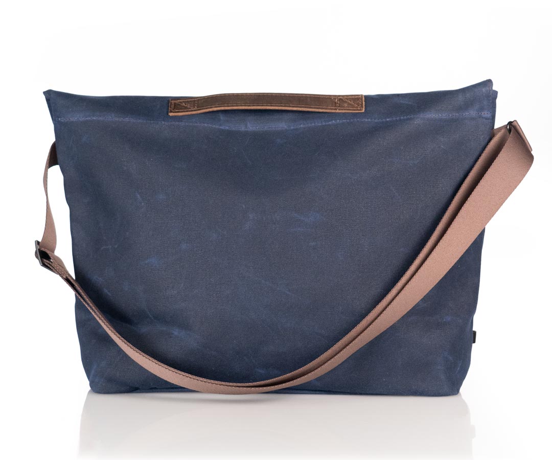Full grain leather handle; wide adjustable strap