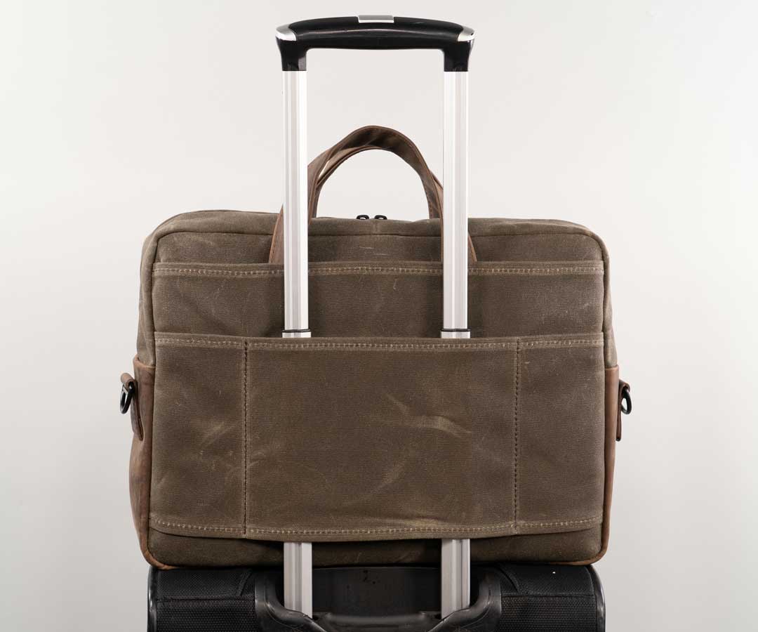 Document back pocket + carry-on handle slot