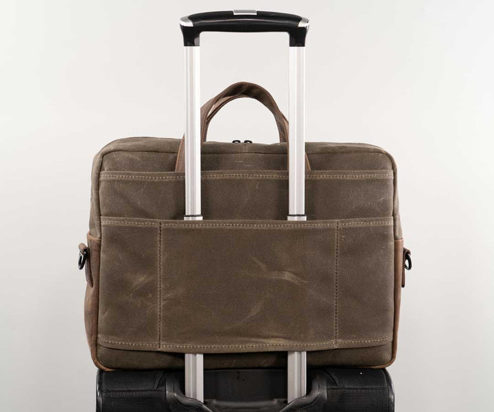 Document back pocket + carry-on handle slot