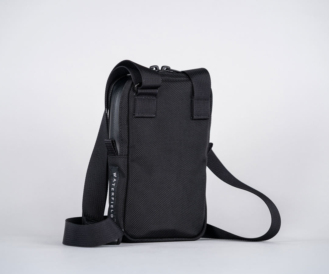 Back. Includes adjustable cam-lock strap