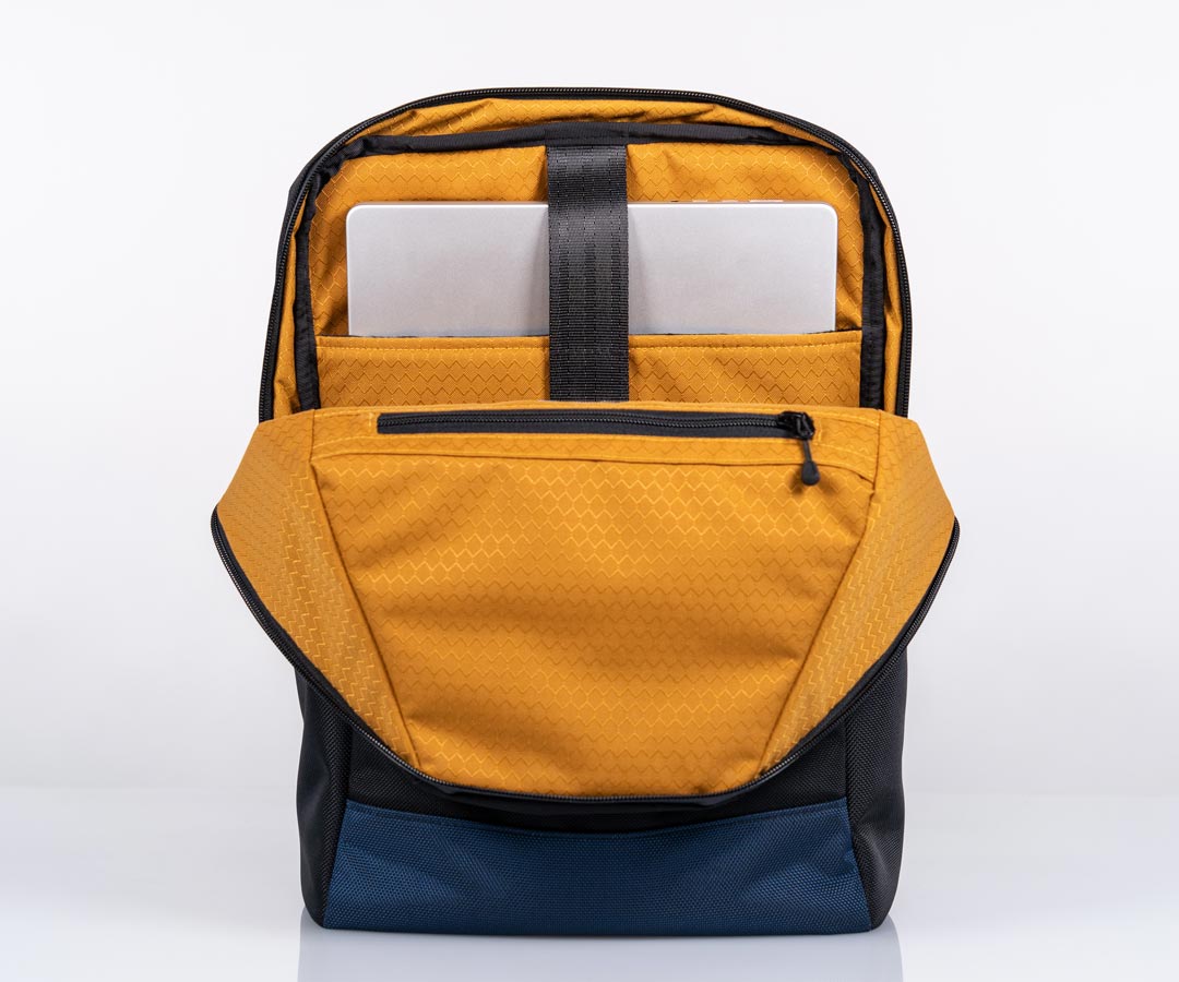 Fits laptops up to 16 inches. Zippered interior pocket.