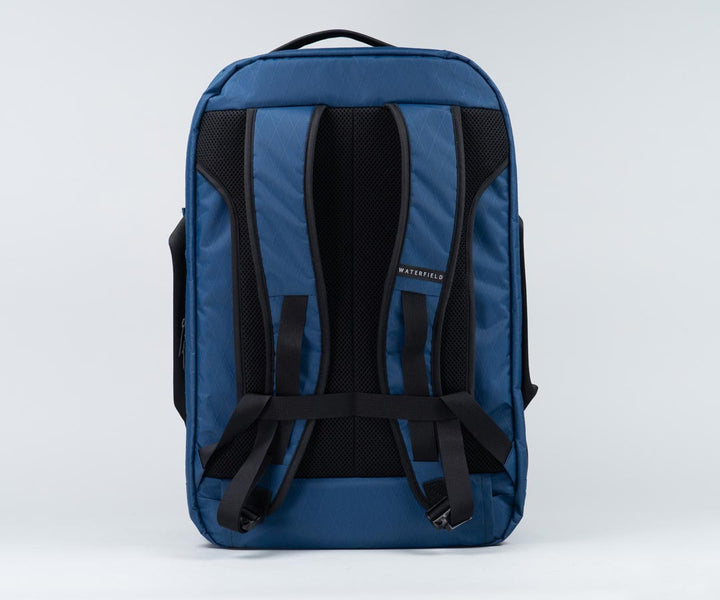 Back mesh slides through suitcase handles. 