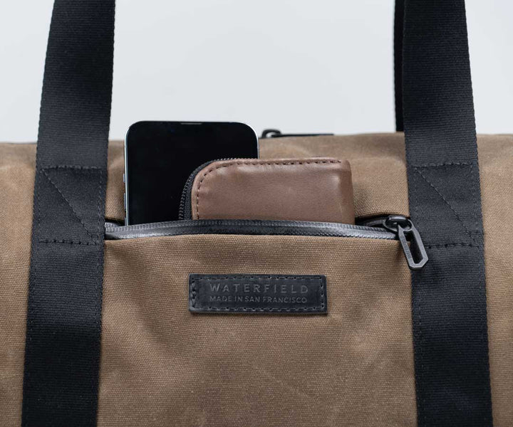 Store frequently-accessed items in the secure, zippered front pocket