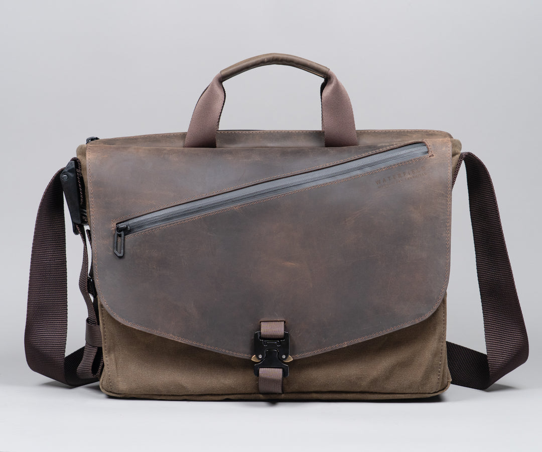 Distinctive dual-leather front flap with waterproof YKK zipper