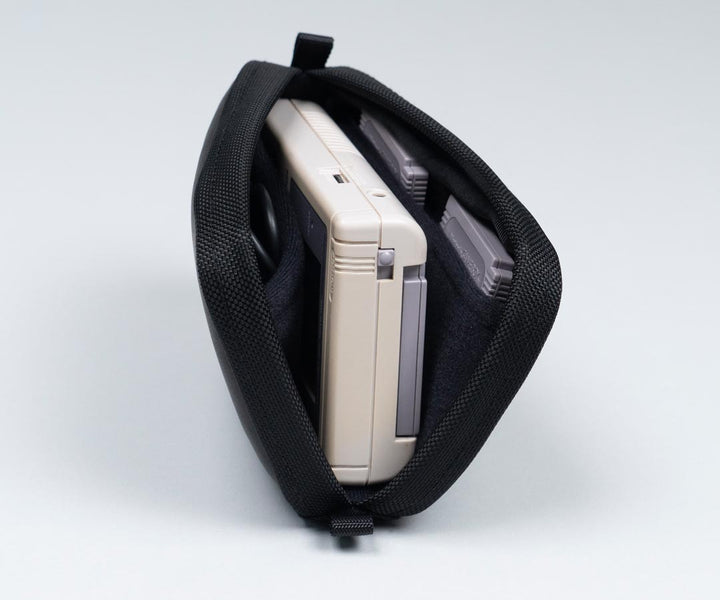 Two side pockets for games & accessories