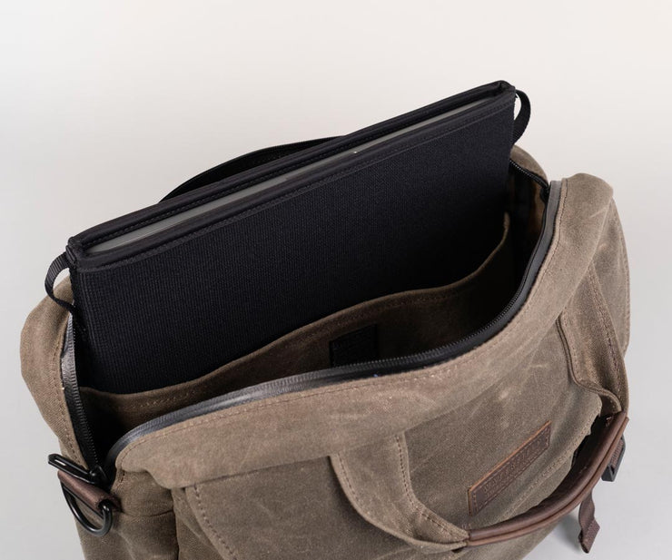 Insert laptop with protective sleeve in the large pocket (Shown: Neo Sleeven $39 sold separately)