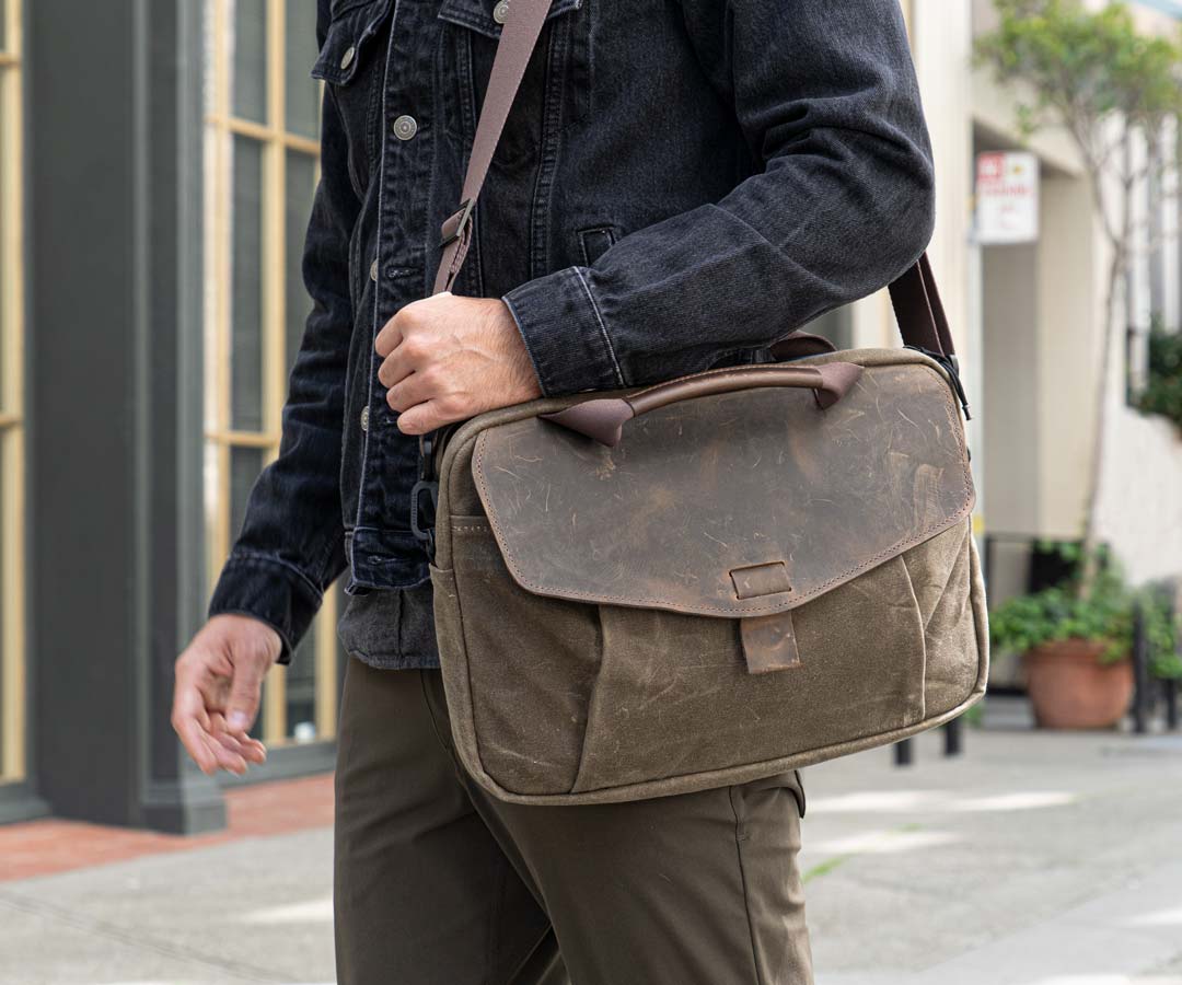 Carry over the shoulder or use the leather-wrapped handles