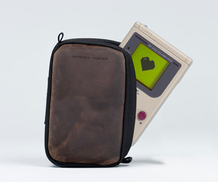 Full-grain leather panel with magnetic closure 