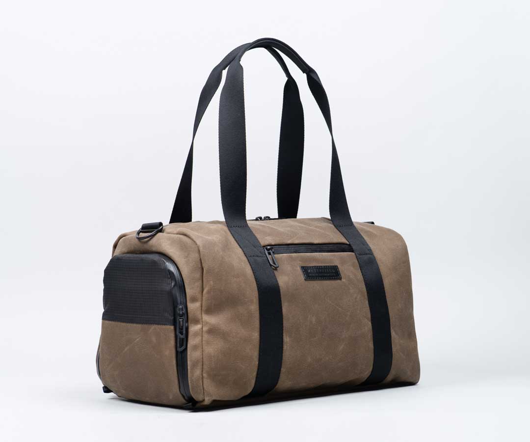 Handle is long enough to carry the bag over the shoulder