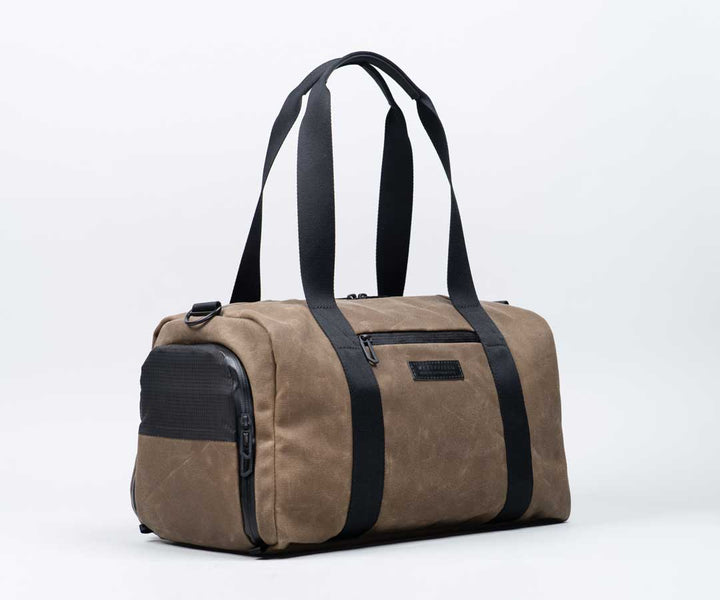 Handle is long enough to carry the bag over the shoulder