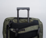 Fits horizontally on top of luggage handles