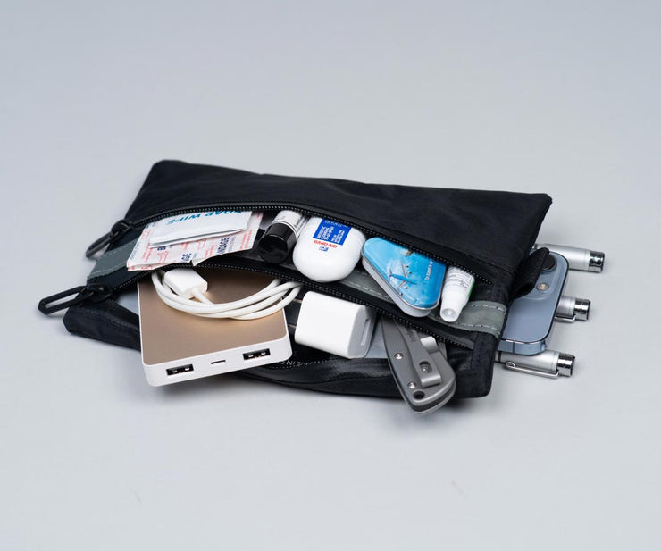 iPhone-centric EDC pouch for carrying daily essentials