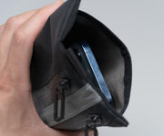 Separate Ultrasuede®-lined phone pocket 
