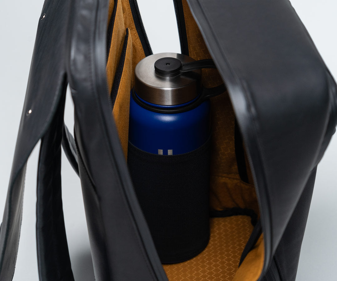 Collapsible water bottle holder