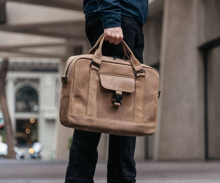Carry by hand (shown in Grizzly leather)