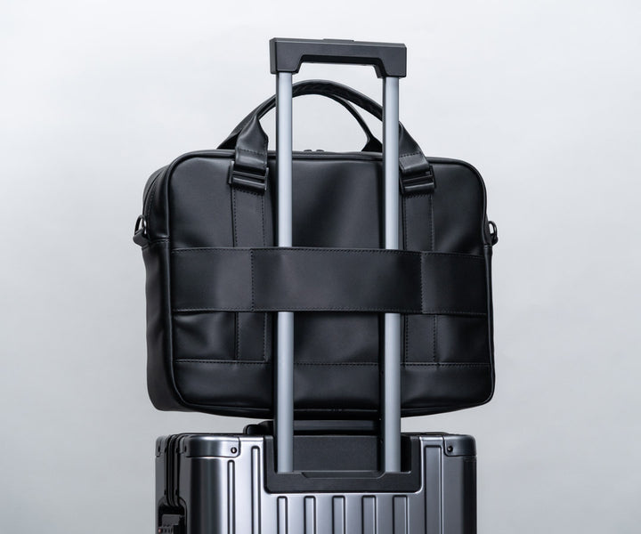 Suitcase handle passthrough 