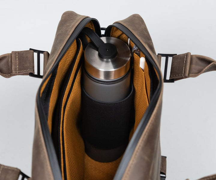 Collapsible water bottle pocket
