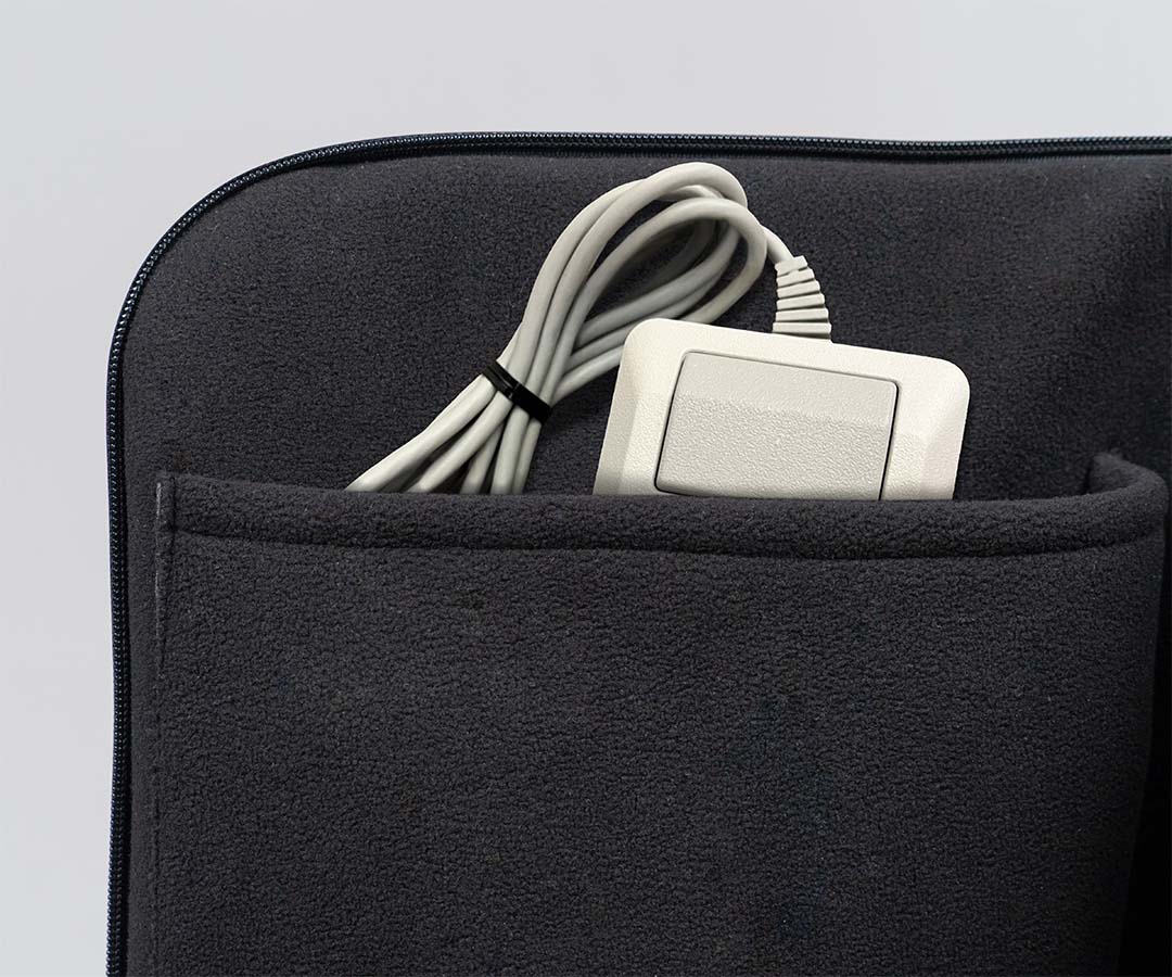 Cushy liner holds your mouse and power brick