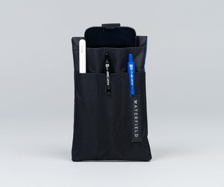 Back — two layers of pockets separate the iPhone from pens/stylus