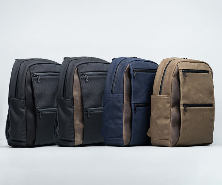 In traditional Waxed Canvas or Ballistic Nylon