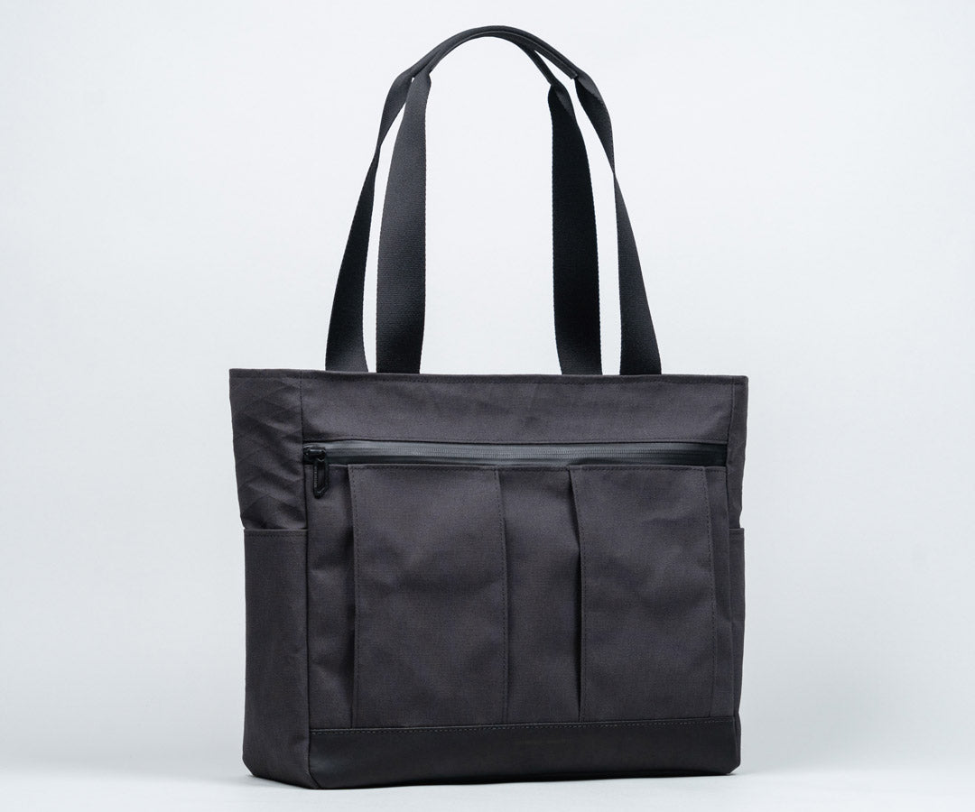 In traditional Waxed Canvas or X-Pac®  Canvas