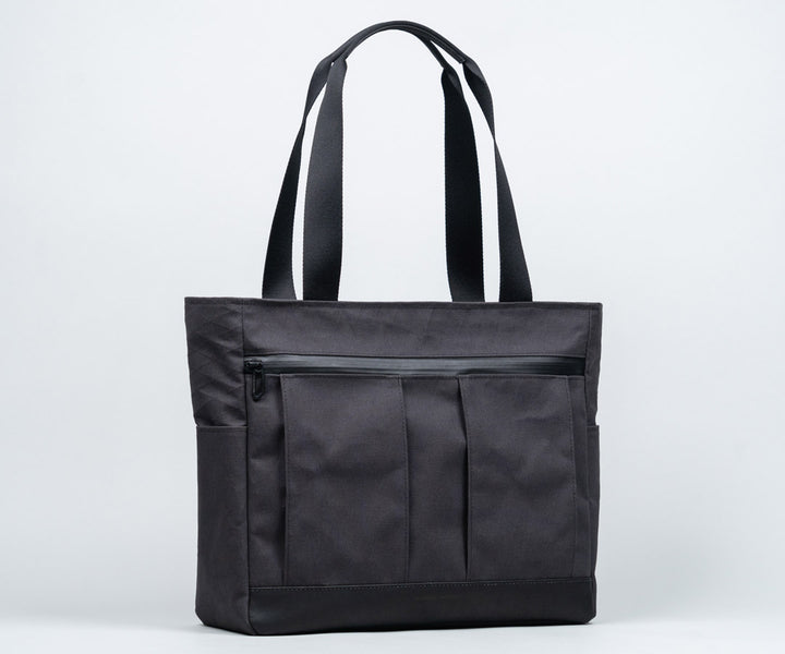 In traditional Waxed Canvas or X-Pac®  Canvas