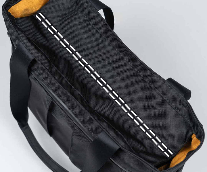 The flap secures shut with strong magnets
