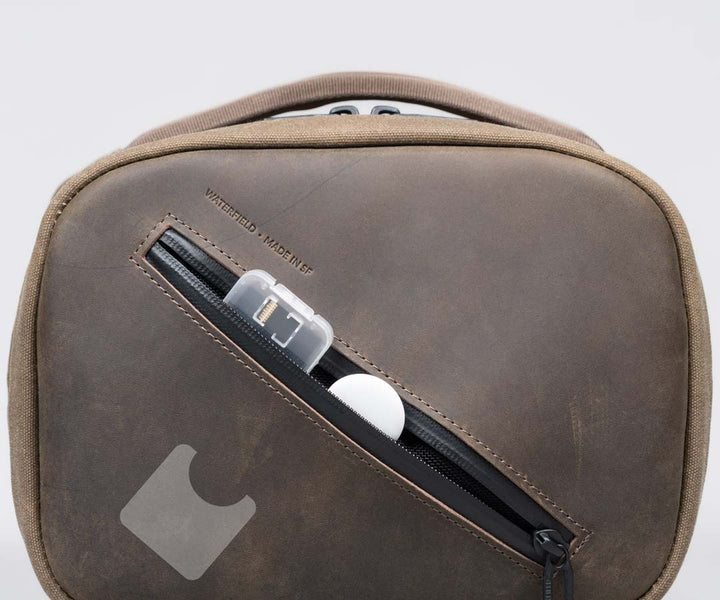 Hidden AirTag slot in top pocket