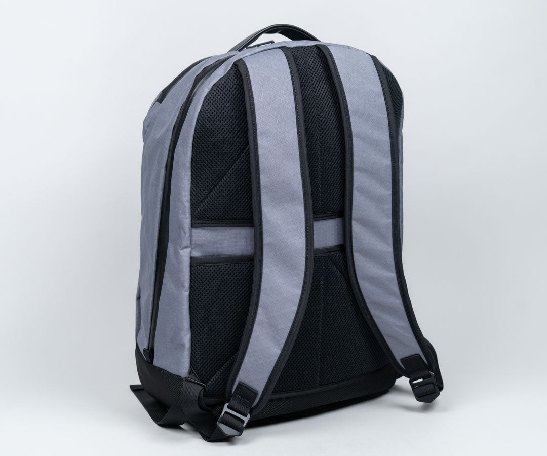 Sweat wicking mesh rear panels