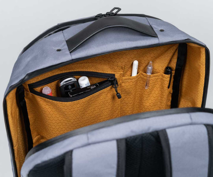 Internal pockets for small items and pens.