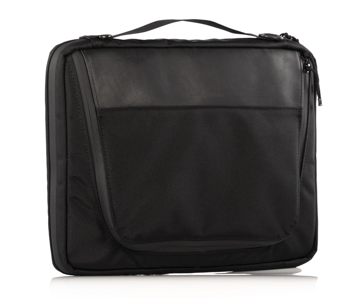 Features full grain leather panel, light webbed handle, two YKK waterproof zippers 