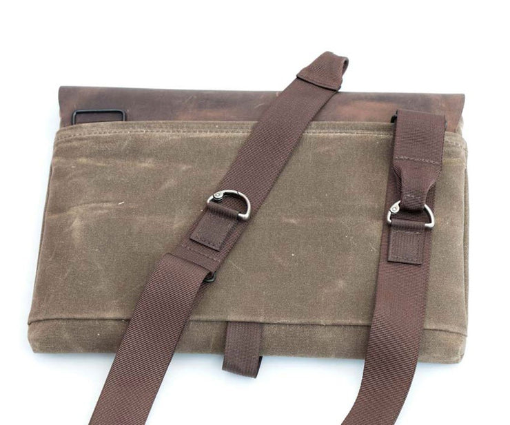 Removable unique straps recede into pocket for a clean look.
