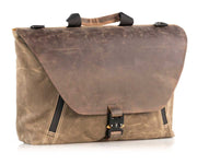 The full-grain leather flap is secured with a real paragliding buckle
