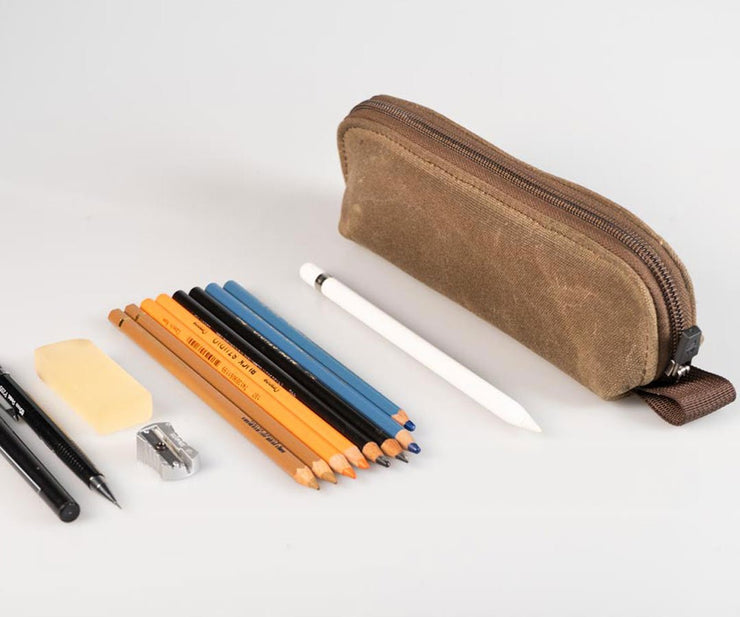 Holds assorted writing implements