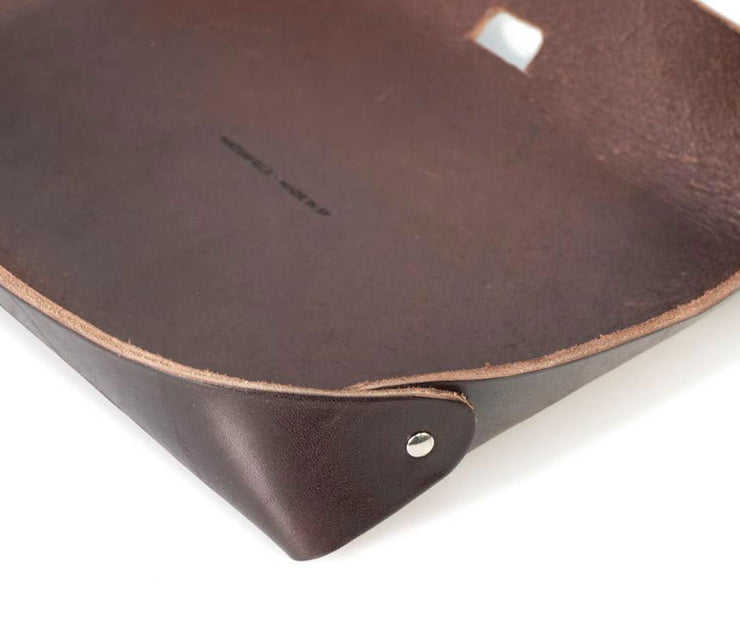 Genuine, premium full grain leather with metal rivets