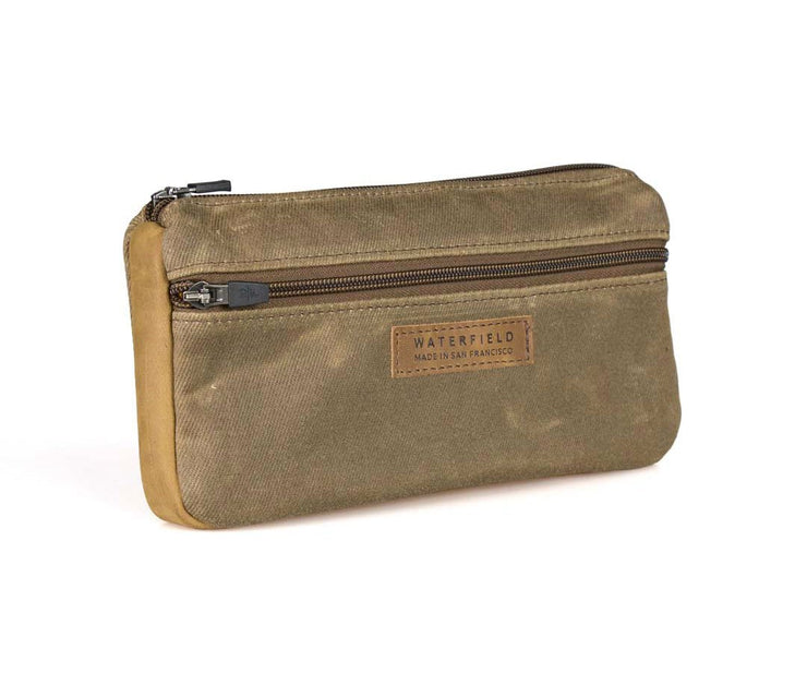 Premium full grain leather accents. Self-locking zipper. 