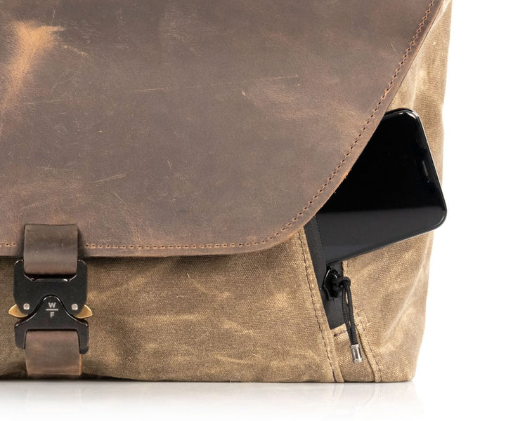 Two angled pockets for quick-access items. Waterproof zipper.