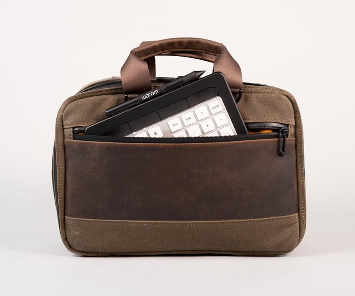 Front zippered pocket for additional accessories (shown: Wacom tablet)