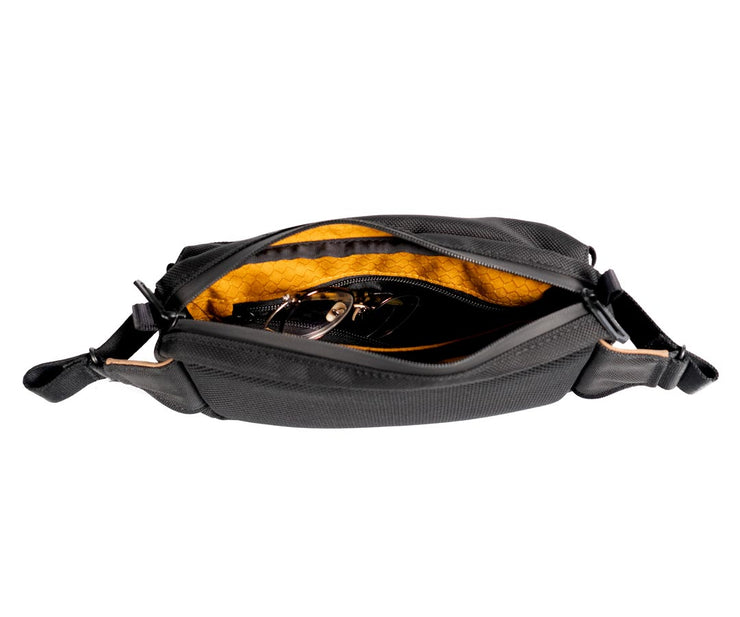 Plushly-lined pocket for glasses 