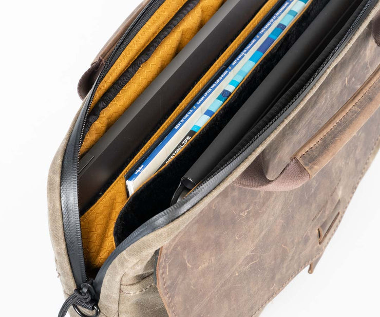 Padded compartment protects  laptop and tablet. 