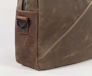 Full-grain leather "boot" and industrial-grade hardware