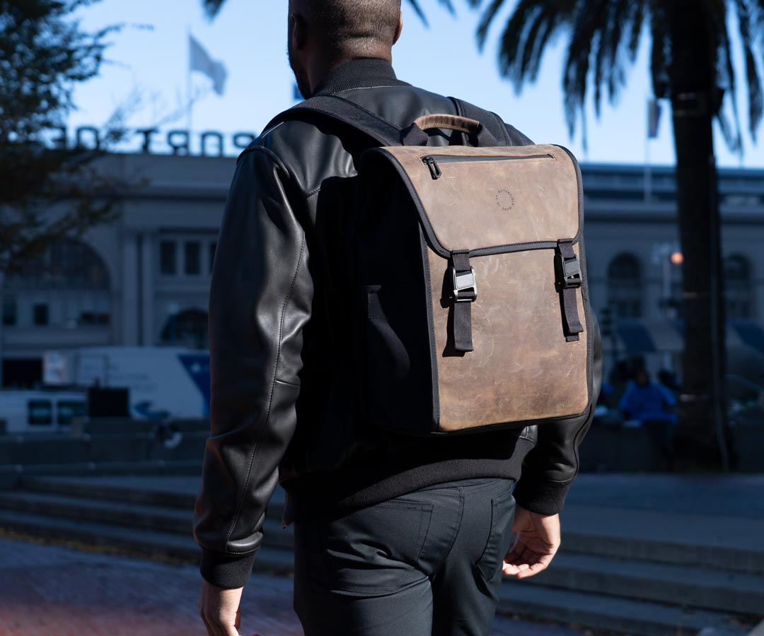 Waxed canvas backpack / rucksack with folded top and waxed canvas