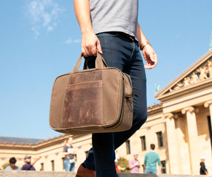 Carry via comfortable leather-topped handles