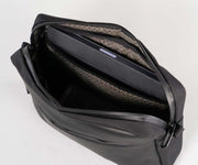Padded side pocket holds an iPad mini or similar-sized tablet