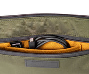 External pocket for power brick, game cards, etc.